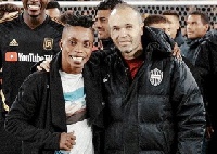 Latif Blessing  with Andres Iniesta