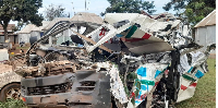 The wreckage of the taxi that rammed into a stationary truck killing seven people