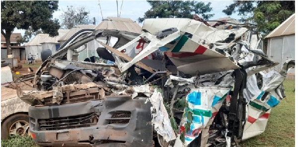 The wreckage of the taxi that rammed into a stationary truck killing seven people