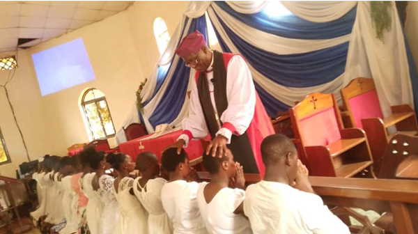 Rev Dr Hannington Mutebi, confirming 47 Christian faithfuls at St John’s Church