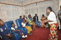 Mrs. Matilda Amissah-Arthur speaking to Afua Ansah and  Phoebe Naaki Odei in her office