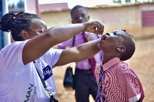 A child is getting receiving the Vitamin Supplement