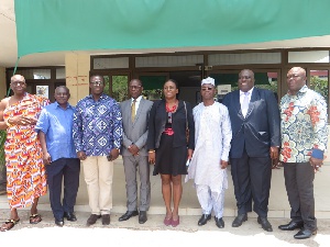 Mr William Owuraku-Aidoo (3rd L) in a group photo with the GRIDCo Board