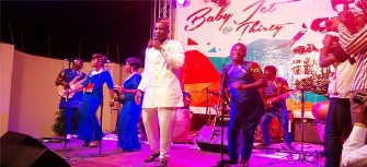 Captain Asamoah Gyan performing at his party