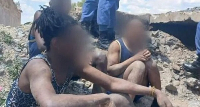 Illegal miners forced out of an abandoned mine shaft and arrested