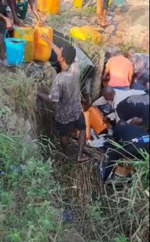 Watch how some Ghanaians siphoned gas oil from a broken BOST pipeline