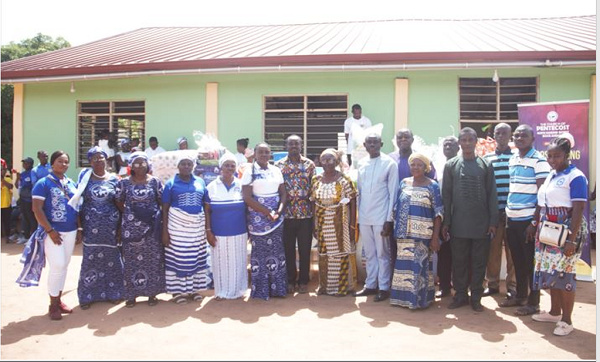 The KEA Women’s Ministry in a photo with the Christian Rehab Center management