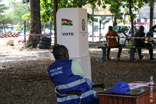 An officer sits  idle as voters did not turn up to cast their vote