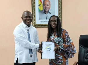 New FDA boss Professor Kwabena Frimpong-Manso Opuni (L) with former FDA boss Delese Darko (R)