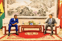 Photo of the CEO of Mineral Commission Isaac Tandoh (L) and Chinese Ambassador Cong Song