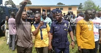 Eastern Regional Minister, Eric Kwakye Darfour with security personnel in Kwahu