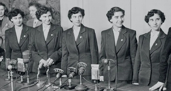 The Dionne sisters at their first formal US press conference in 1952