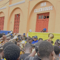 Accra Academy students cheering infront of the Ellen House