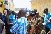 Prophet Arjarquah interacting with some prison officers after donating items to the prisoners