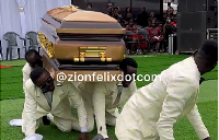 Pallbearers displaying with the casket