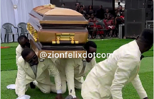 Pallbearers displaying with the casket