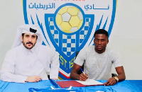 L-R  Al Kharaitiyat SC club official and Glid Otanga