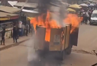 Screen shot from video showing truck engulfed by fire