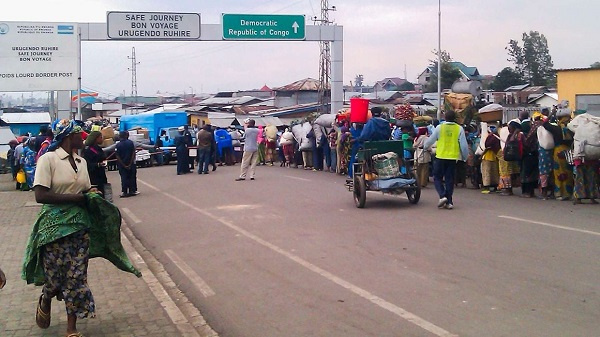 People doing cross border activities at Rwanda-DRC Rubavu border