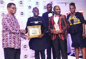 Staff of Man Capital receiving the award