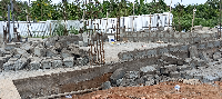 Unknown armed land guards destroy ongoing building of Ellembelle NDC office at Awiaso