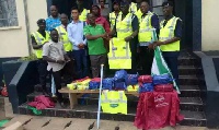 APSONIC Motors presenting the items to some personnel from Ghana Police Service