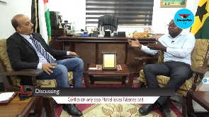 Palestinian Ambassador to Ghana, Abdalfatah Ahmed Khalil Alsatarri,  interacting with Daniel Oduro