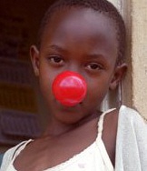 Comic Relief Child Wearing Red Nose