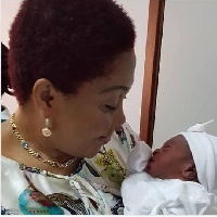 Mrs Lordina Mahama with her grandchild