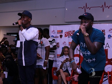 Medikal and Kofi Kinaata on stage