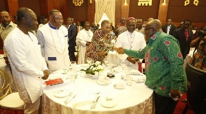 President Akufo-Addo and Finance Minister with some members of the clergy