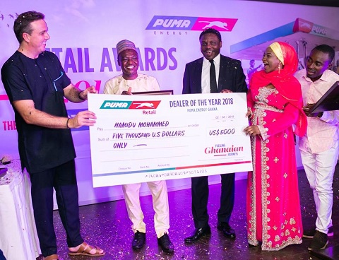Hamidu Mohammed, Dealer of the Year (2nd from left) with the COO of Puma Energy West Africa (left)