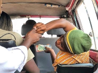File photo of a public transport conductor