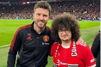 Frank (R) with United manager Carrick (L)