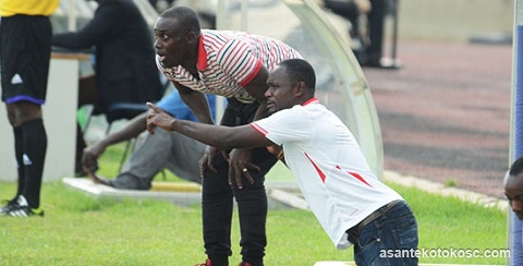 Asante Kotoko's Godwin Ablordey with Michael Osei
