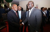 Justice Atuguba and Sammy Awuku exchanging pleasantries