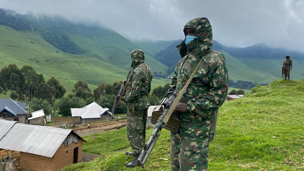 EACRF soldiers on guard in Mushaki, North Kivu province in the DR Congo