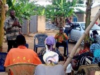 Fredrick Opare Ansah interacting with some members of his Constituency