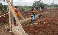 Workers at the construction site of the novel 400Kw power hybrid waste to energy treatment facility