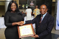 Peace Hyde (Left) accepting the new ambassadorial