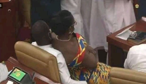 An old photo of Ursula Owusu-Ekuful sitting on Mintah Akandoh in parliament