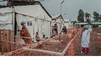 Patients stand at an mpox treatment centre at Nyiragongo General Referral Hospital, in DRC