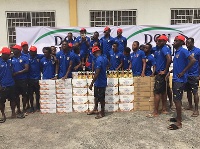Players of AshantiGold  SC posing with the drinks presented by