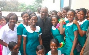 Former President John Dramani Mahama with some nurses