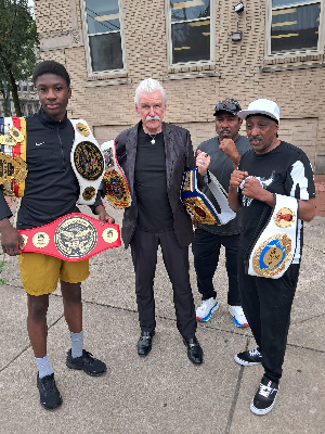 Joseph Awinongya Jr. with his titles