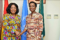 Foreign Affairs Minister, Mrs Shirley A. Botchway (L) in a handshake with Mrs Angela Trenton-Mbonde