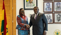 Petra Aba Asamoah (L) shaking hands with Communications minister Samuel Nartey George