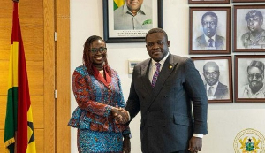 Petra Aba Asamoah In A Handshake With The Minister Of Communication Sam George