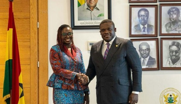 Petra Aba Asamoah (L) shaking hands with Communications minister Samuel Nartey George