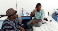 Lands and Natural Resources Minister, John Peter Amewu, visited Latif iddris at the Hospital